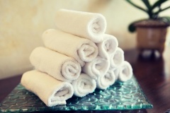 rolled bath towels at hotel spa