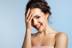 Beautiful laughing  woman with pure skin and natural make up.