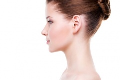 Profile portrait of young beautiful woman.